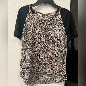 Cheetah print work blouse.